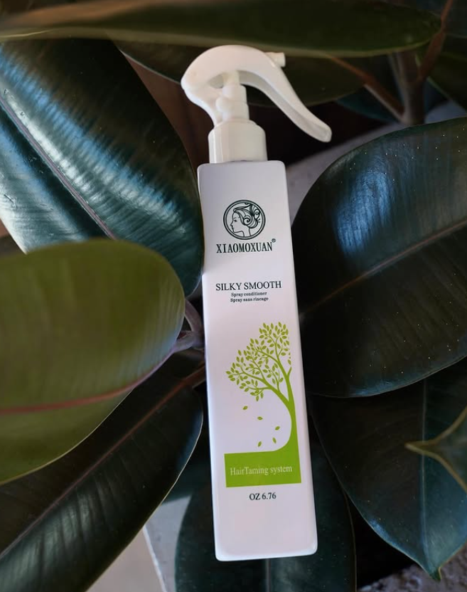 Несмываемый спрей-кондиционер с чайным деревом для поврежденных волос Xiaomoxuan Silky Smooth Spray Conditioner